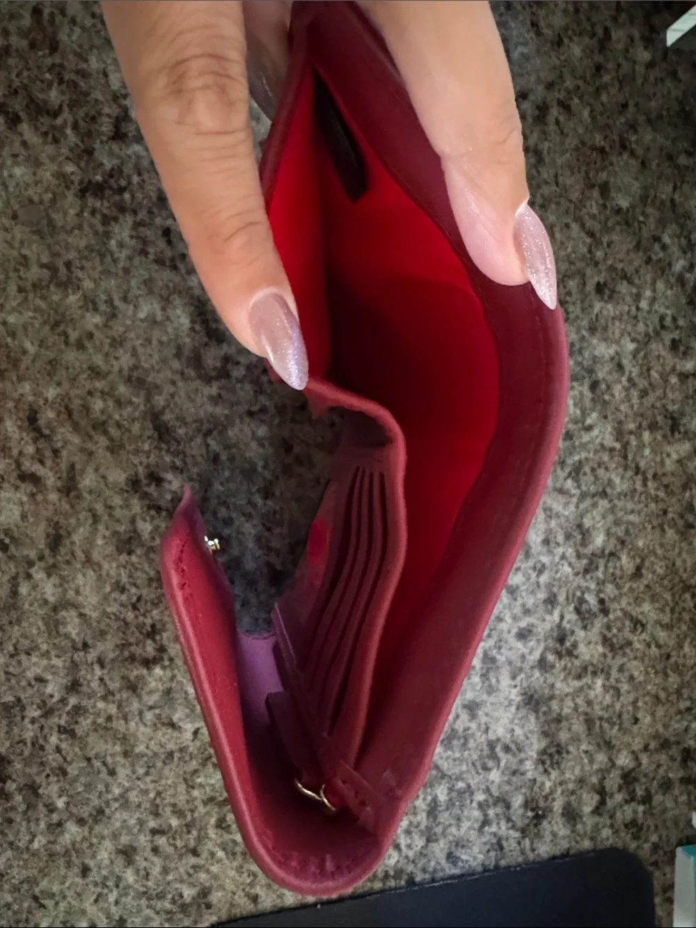 Dooney & Bourke Burgundy Leather wallet with Gold Logo